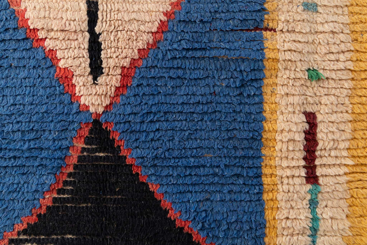 Detail of a vintage runner rug from Azilal region. Great 70&#39;s vibes pattern in low key colors. Beautiful unique piece of Berber arts. Selected from piles of rugs by TamTam Interiors.